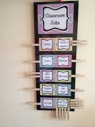 class jobs chart with names on clothes pegs to move each