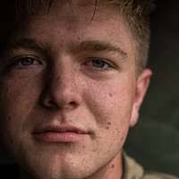 U.S. Marine Corps veteran Robert Caudill pedals a recumbent