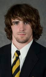 Kelly, Evans Win Titles