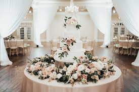 Dreamy White Wedding Cake With Fresh Floral Accents White Wedding Cake Wedding Wedding Cakes