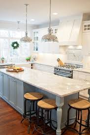 The first step in my island makeover was wrapping the island in beadboard and painting the island front and cabinet doors. Kitchen Island With Beadboard Trim Transitional Kitchen Britt Lakin Photography