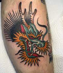 The head of the tattoo fits nicely over the chest area, while the rest of the tattoo lies in the arm areas. Old School Dragon Head Tattoo Novocom Top