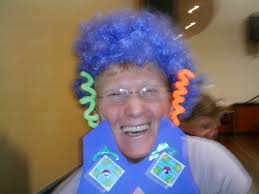 Who are the two line dancing ladies with blue hair and stunning earrings?