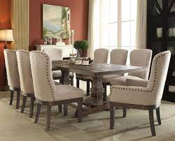 Brown bonded leather or blue, gray, red or beige fabric. Landon Salvage Brown Dining Table With Extension Leaf