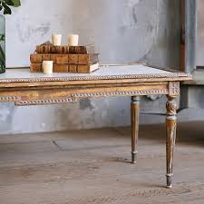 The circular top with a raised edge and inset marble top, the apron with fluting and raised on circular fluted legs ending in brass casters. Antique Louis Xvi Coffee Table Antique Coffee Tables Table Coffee Table