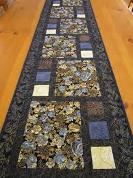 Quilted Table Runner Good Idea For Winter Animal Panels And Coordinating Fabric Kathy With The Ri Patchwork Table Runner Table Runners Quilted Table Runners