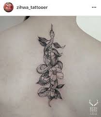 Black And Gold Snake Tattoo Linear Snake Wrapped Around Flower Black Line Work Tattoo Idea Flower Tattoos Tattoos Line Work Tattoo