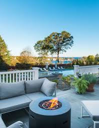 Blue Stone Patio Fire Pit Outdoor Furniture Grill White Railings Plush Grey Cushions Bluestone Patio Patio Stones Patio