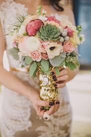 From bulking up your bouquet to stopping centerpieces from wilting, we found plenty of inspired ways to use ahead, discover 20 functional and trendy ways to use succulents in your wedding. New Year S Eve Cleveland Wedding Ruffled Wedding Bouquets Floral Wedding Succulent Bouquet Wedding