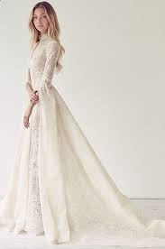 High neck dress with sleeves. 33 Elegant High Neck Wedding Dresses To Try Mrs To Be Wedding Dresses High Neck Wedding Dress Wedding Dresses Vintage