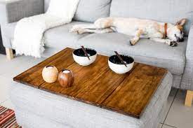 It has a neutral soft fabric top and an extra storage shelf on the coffee tables: Serving Ottoman Table Top Ottoman Table Ottoman Coffee Table