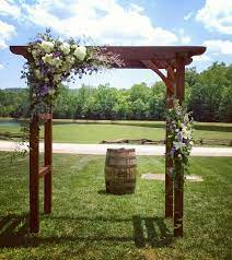 And there is your classic fall wedding arbor! Rustic Barn Wedding Arbor Flowers Wedding Arches Outdoors Rustic Barn Wedding Wedding Arbor Rustic
