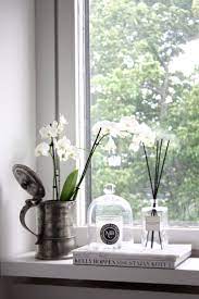 Homevialaura Bedroom Window Sill Antique Silver Flower Vase White Orchid Kelly Hoppen Coffee Table B Window Sill Decor Window Ledge Decor Ledge Decor