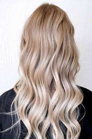 This hairstyle is much lighter than the first, beginning with a dirty blonde color at the top and the almost black hair fades gracefully down to a warm brown color, almost verging on an auburn hue. 35 Refreshing Lowlights Ideas For Dimensional Hair Colors