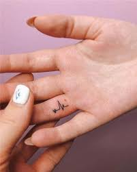 21 Meaningful Small Tattoos Cute And Inspirational Biseyre Tiny Tattoos For Girls Hand Tattoos Hand Tattoos For Women