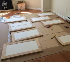Would it be better to spray them? Strathcona Home Diy 80s Kitchen Cabinet Overhaul Melamine Cabinets Diy Cabinets Kitchen Cabinet Remodel