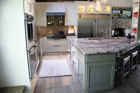 For larger kitchens, two islands might work better than one large one. Kitchen Remodel With Custom Cabinets A Huge Island And Dual Sinks Columbia Mo Dimensions In Wood