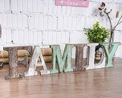 Wooden decor for wall art and home decoration, wooden furniture in rustic style for country house. Amazon Com Wood Family Signs Wall Decor Decorative Wooden Blocks Rustic Letters Cutout Farmhouse Home Decor Multicolor Bedroom Kitchen Living Room Table Centerpiece Words Freestanding With Double Sided Tape Everything Else