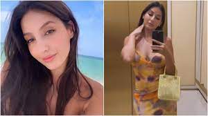 Nora Fatehi in a bikini and printed bodycon dress sets Miami on fire during  her beach holiday: Watch videos | Fashion Trends - Hindustan Times