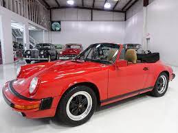 The long, flat hood, the steeply inclined windshield and the roof line that slopes. 1989 Porsche 911 Carrera Cabriolet
