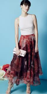Wearing a smart top and maxi skirt for weddings is a novel idea that anyone can pull off. Burgundy Midi Skirts Howtowear Fashion