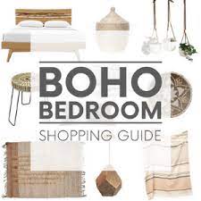 It includes two nightstands and one bed, all made from a blend of solid and engineered wood in a neutral hue. Boho Bedroom Shopping Guide Bohemian Bedroom Decor