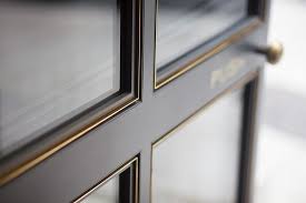 In The Up And Coming District Of Poho A Charming New Chateau Has Set Down Roots Joinery Design Steel Doors And Windows Door Design