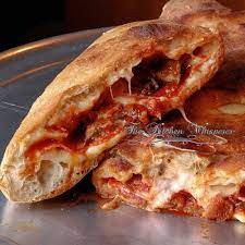 Ultimate Pizza Calzone Recipe Recipes Calzone Cooking