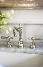 Vintage Style Nickel Hot And Cold Faucet From Rohl Interior Design By Linda Mcdougald Powder Room Faucets Bathroom Faucets Bathroom Sink Faucets