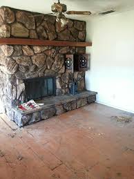 The color matches your wall and blends well with the house. Painting Huge Rock Fireplace