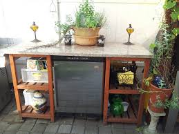 Some Wood A Slab Of Granite And An Hour And You Have A Great Outdoor Buffet It Offers Plenty Of Storage And Frames The Out Outdoor Kuhlschrank Buffet Outdoor