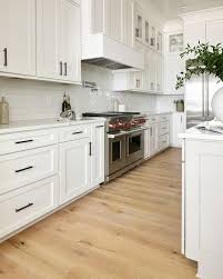 White Kitchen Cabinets Paired With