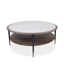 This functional design features bottom shelf for added storage, metal strap embellishing on top panel, and sturdy metal legs for extra stability. Caleb Round Coffee Table Scandesigns Furniture