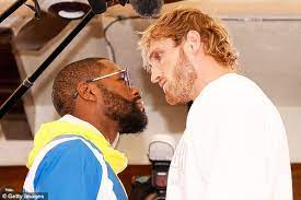 Logan paul, left, towers over floyd mayweather during their media availability this week. Izyw6pk2pi14tm