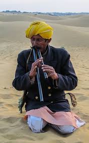 A Man Playing Flute In The Dessert Rajasthan India India Culture Rajasthan India
