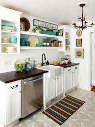 This little kitchen does an impeccable job of mixing traditional elements like the black accent wall, rustic stools, and modern. Small 1 Wall Kitchen Fasrnv