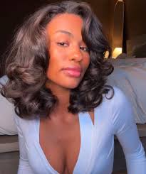 Does anyone know a good silk press stylist?