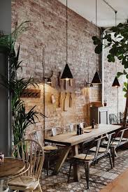 Create a vivid setting cafeteria design by playing with an array of colors and diverse coffee shop wall design options. 50 Rustic Dining Wall Decor Ideas You Can Make By Yourself Industrial Restaurant Interior Cafe Interior Design Coffee Shops Interior