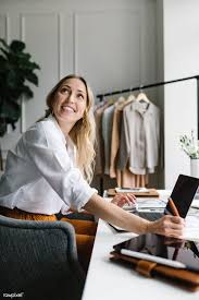 Download Premium Image Of Young Female Designer In A Boutique 1220808 Personal Fashion Stylist Branding Photoshoot Brand Stylist