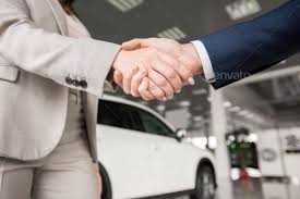 Business People Shaking Hands Close Up In 2020 Business People Dealership Showroom Close Up