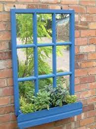 Garden Mirrors Reflecting Around The Space Earth Designs Garden Design And Build Garden Mirrors Small Patio Garden Outdoor Mirror