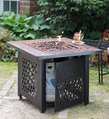 Gas fire pits have many advantages. Propane Gas Fire Pit With Tile Mantel Gives Your The Warmth And Ambiance Of A Real Wood Fire Without The Fire Pit Table Propane Fire Pit Table Outdoor Fire Pit