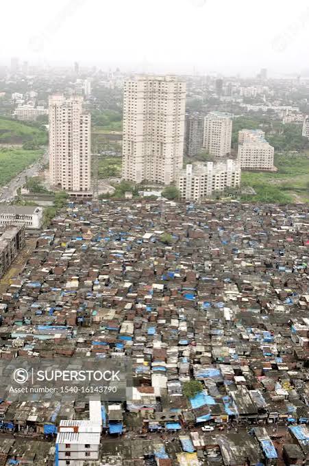 An aerial view of Towers at Wadala and slums represents contrast city in central part of Bombay Mumbai ; Maharashtra ; India - SuperStock