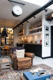 Typically, the garage portion offers parking for one or more vehicles on the main floor with the living quarters positioned above the garage. Home Decorating Diy Projects Live In A Former Garage In Amsterdam Decor Object Your Daily Dose Of Best Home Decorating Ideas Interior Design Inspiration