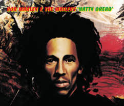 Who does the artwork for his album covers?