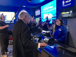 Downtown Las Vegas Plaza Hotel Shows Off Remodeled William Hill Sports Book With Former Mayor Goodman Making First Bet Friday Lvsportsbiz