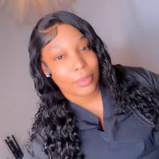 Eloise Jones of the Independence Police Department pictured here with  famous actor Kevin Costner during the production of “The Highwaymen” being  filmed in Independence.