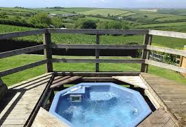 Tubbs Delight Malborough Kingsbridge Devon England Uk Tubbs Delight Is A Dog Friendly Self Catering Detached Bungal In 2020 Holiday Cottage Hot Tub Holiday Home