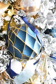 Choose from alberta spruce, douglas fir, virginia pine, flocked and accented. Flocked Christmas Tree Decor Blue Silver Gold Citrineliving