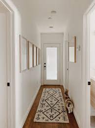 Bright wall decor is able to radically transform the interior of the hallway or corridor. Our Simple Hallway Makeover Almost Makes Perfect Narrow Hallway Decorating Hallway Wall Decor Hallway Decorating